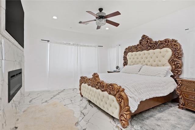 5801 S Moonstone Peak Dr, Bakersfield, CA 93313 - bedroom featuring recessed lighting, marble finish flooring, heating unit, a fireplace, and a ceiling fan