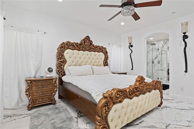 5801 S Moonstone Peak Dr, Bakersfield, CA 93313 - bedroom featuring marble look tiles, recessed lighting, arched walkways, a ceiling fan, and connected bathroom