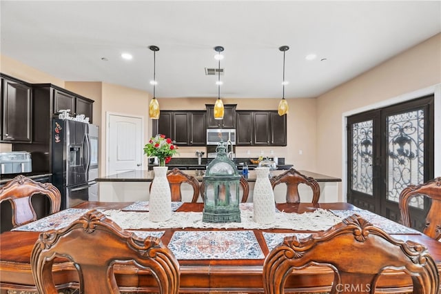 5801 S Moonstone Peak Dr, Bakersfield, CA 93313 - dining area featuring french doors and recessed lighting