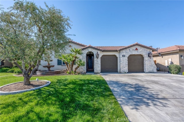 5801 S Moonstone Peak Dr, Bakersfield, CA 93313 - mediterranean / spanish house featuring a garage, a front lawn, stone siding, and a tiled roof