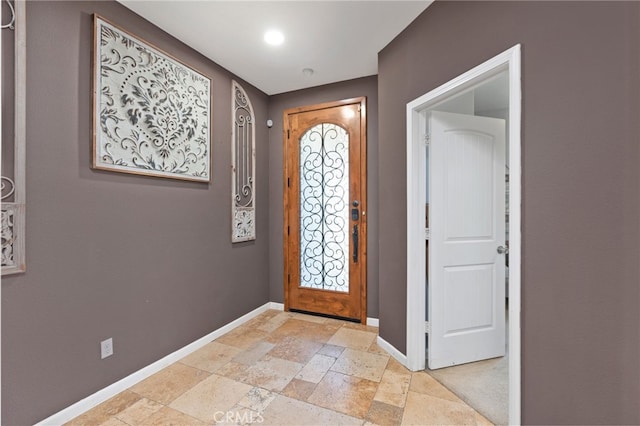 5801 S Moonstone Peak Dr, Bakersfield, CA 93313 - entrance foyer featuring baseboards and stone tile flooring