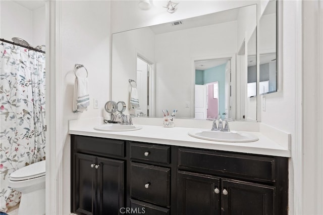 5801 S Moonstone Peak Dr, Bakersfield, CA 93313 - full bath featuring double vanity and toilet