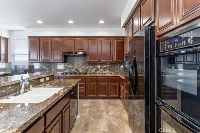 28465 Port Cv, Menifee, CA 92585 - kitchen with freestanding refrigerator, decorative backsplash, dark stone counters, under cabinet range hood, and stainless steel gas stovetop