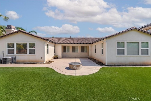 28465 Port Cv, Menifee, CA 92585 - back of house with an outdoor fire pit, a patio, stucco siding, a lawn, and a tile roof
