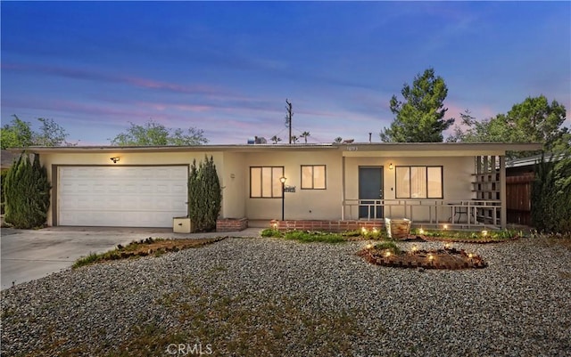 16193 Colina St, Victorville, CA 92395 - view of front of property with an attached garage and driveway