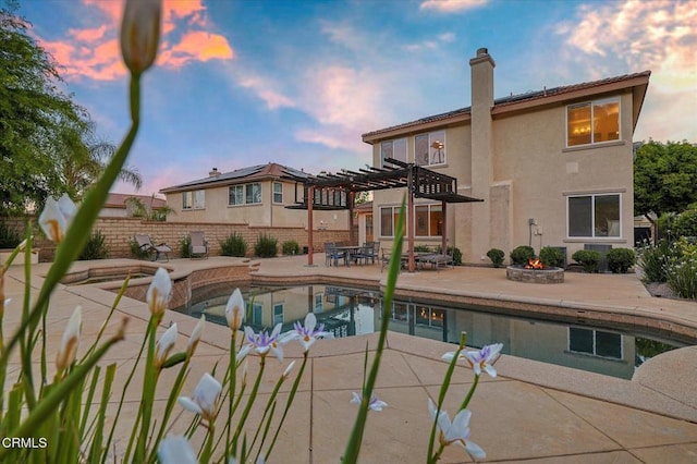 23839 Rio Ranch Way, Valencia, CA 91354 - pool at dusk featuring a pergola, a patio, an outdoor fire pit, and fence