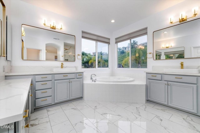 23839 Rio Ranch Way, Valencia, CA 91354 - full bathroom with a bath, marble look tile flooring, recessed lighting, two vanities, and a shower