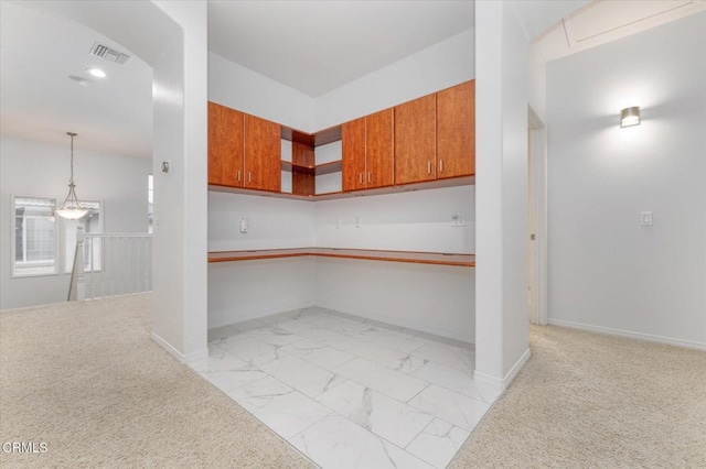 23839 Rio Ranch Way, Valencia, CA 91354 - kitchen with brown cabinets, open shelves, baseboards, light colored carpet, and recessed lighting