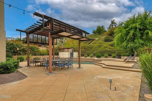 23839 Rio Ranch Way, Valencia, CA 91354 - view of patio featuring a pergola, fence, and outdoor dining space