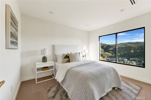 4335 Chaumont Rd, Woodland Hills, CA 91364 - bedroom with baseboards, wood finished floors, and recessed lighting