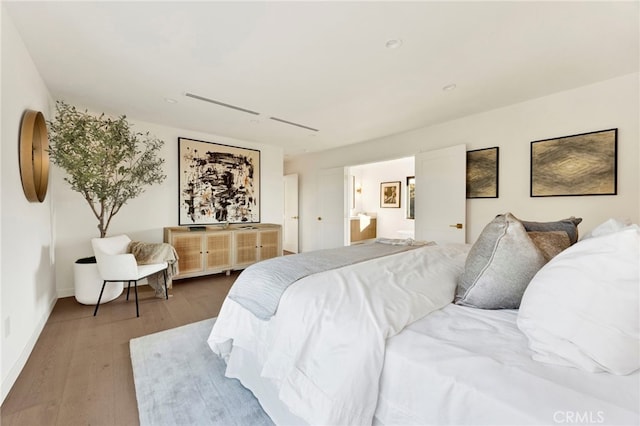 4335 Chaumont Rd, Woodland Hills, CA 91364 - bedroom with wood finished floors, baseboards, and ensuite bathroom