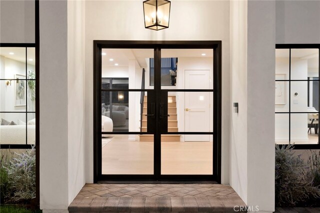 4335 Chaumont Rd, Woodland Hills, CA 91364 - doorway to property with french doors and stucco siding
