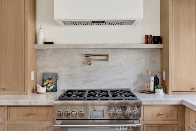 4335 Chaumont Rd, Woodland Hills, CA 91364 - kitchen with high end stove, exhaust hood, decorative backsplash, and light countertops