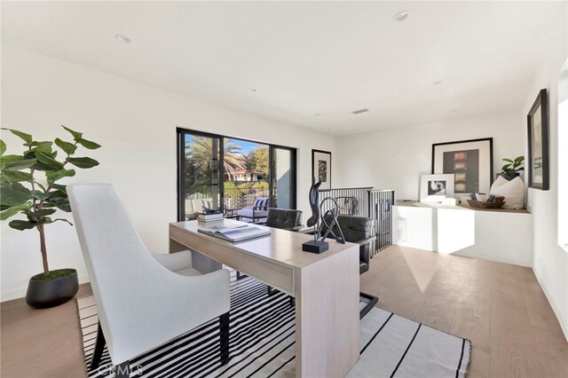 4335 Chaumont Rd, Woodland Hills, CA 91364 - home office with wood finished floors