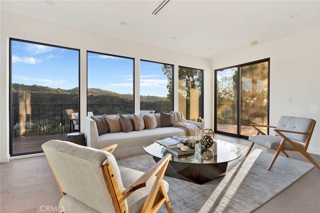 4335 Chaumont Rd, Woodland Hills, CA 91364 - sunroom featuring wood finished floors and a mountain view