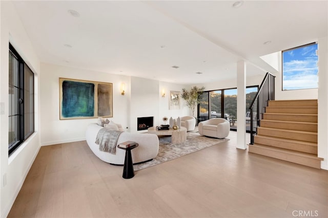 4335 Chaumont Rd, Woodland Hills, CA 91364 - living area with wood finished floors, stairway, and baseboards