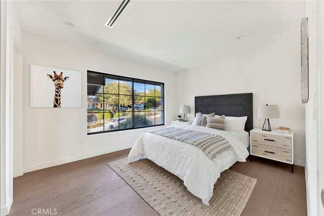 4335 Chaumont Rd, Woodland Hills, CA 91364 - bedroom featuring wood finished floors and baseboards
