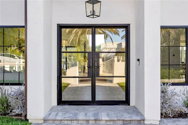4335 Chaumont Rd, Woodland Hills, CA 91364 - view of exterior entry with french doors and stucco siding