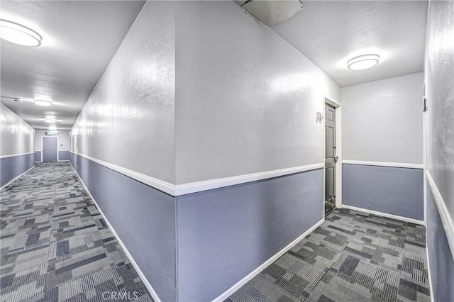 460 Oak St Unit 316, Glendale, CA 91204 - hall featuring carpet flooring, a textured wall, and baseboards
