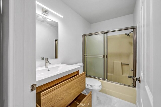 460 Oak St Unit 316, Glendale, CA 91204 - full bathroom with toilet, vanity, combined bath / shower with glass door, and marble look tile flooring