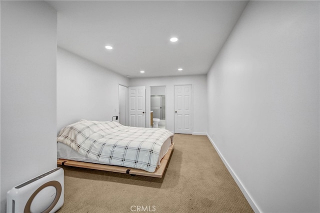 460 Oak St Unit 316, Glendale, CA 91204 - bedroom featuring light colored carpet, baseboards, recessed lighting, and connected bathroom