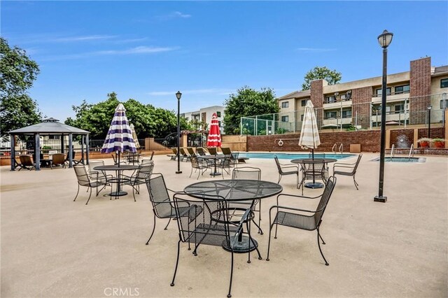 460 Oak St Unit 316, Glendale, CA 91204 - view of community featuring fence, a pool, a gazebo, and a patio