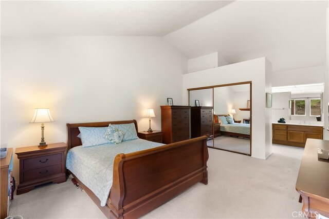 21242 Bristlecone, Mission Viejo, CA 92692 - bedroom featuring light carpet, vaulted ceiling, a closet, and ensuite bathroom
