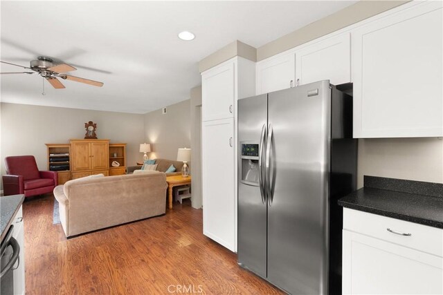21242 Bristlecone, Mission Viejo, CA 92692 - kitchen featuring stainless steel fridge, a ceiling fan, light wood-style flooring, white cabinetry, and dark countertops