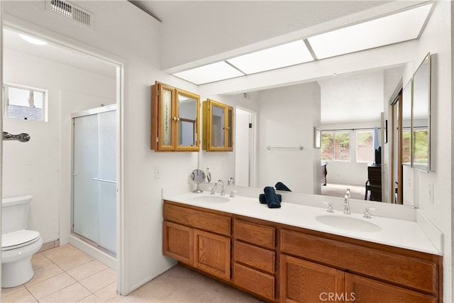 21242 Bristlecone, Mission Viejo, CA 92692 - bathroom featuring toilet, a stall shower, double vanity, and tile patterned flooring