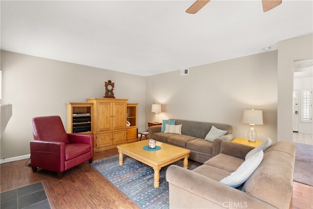 21242 Bristlecone, Mission Viejo, CA 92692 - living room featuring ceiling fan, wood finished floors, and baseboards