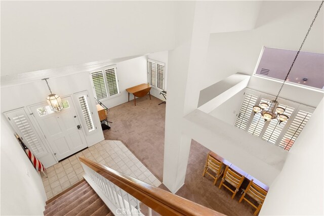 21242 Bristlecone, Mission Viejo, CA 92692 - carpeted foyer with a high ceiling and a chandelier