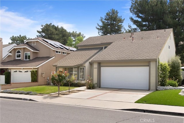 21242 Bristlecone, Mission Viejo, CA 92692 - view of front of property with driveway, an attached garage, a front lawn, and a shingled roof