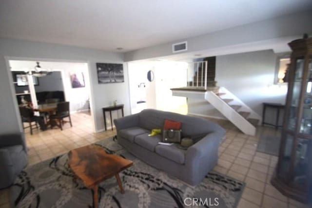 19555 Chadway St, Canyon Country, CA 91351 - tiled living room with stairs