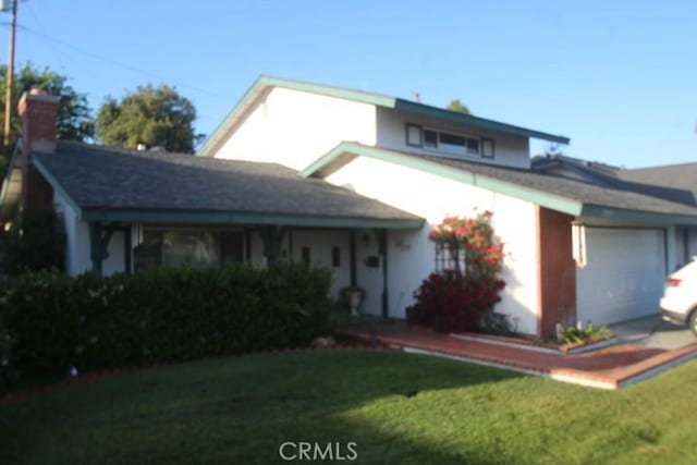 19555 Chadway St, Canyon Country, CA 91351 - view of front of house featuring a front lawn and a garage