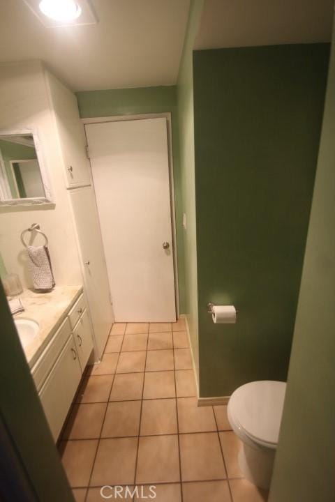 19555 Chadway St, Canyon Country, CA 91351 - bathroom with toilet, tile patterned flooring, and vanity