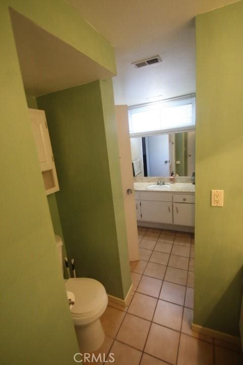 19555 Chadway St, Canyon Country, CA 91351 - bathroom featuring tile patterned flooring, vanity, and toilet