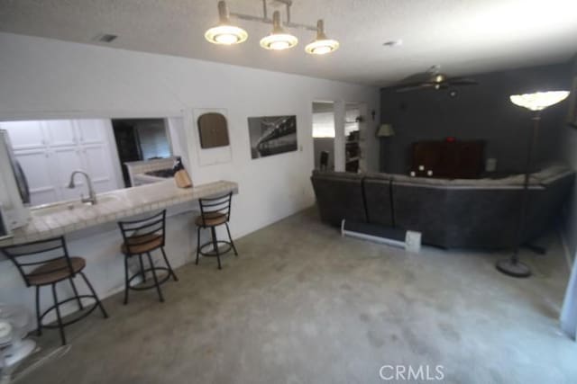19555 Chadway St, Canyon Country, CA 91351 - living room featuring a ceiling fan and lofted ceiling