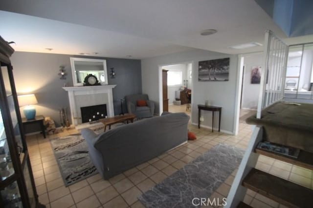 19555 Chadway St, Canyon Country, CA 91351 - tiled living room featuring a fireplace