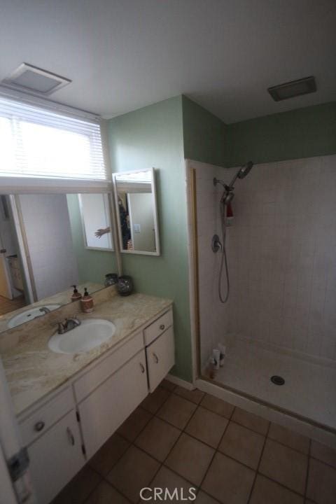 19555 Chadway St, Canyon Country, CA 91351 - full bathroom with a stall shower, tile patterned flooring, and vanity