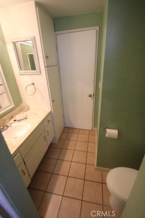 19555 Chadway St, Canyon Country, CA 91351 - bathroom featuring tile patterned floors, toilet, and vanity