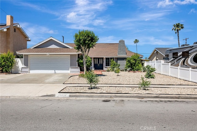 27049 Langside Ave, Canyon Country, CA 91351 - single story home with concrete driveway, fence, stucco siding, an attached garage, and roof with shingles