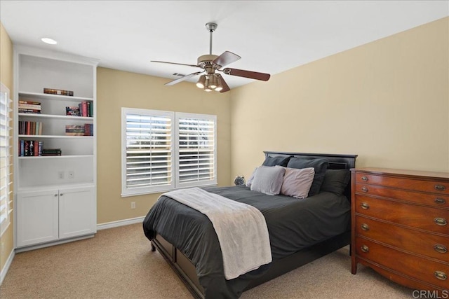 38161 Butterfly Ct, Yucaipa, CA 92399 - bedroom with light colored carpet, a ceiling fan, and baseboards