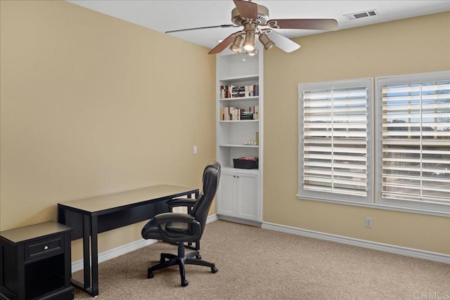 38161 Butterfly Ct, Yucaipa, CA 92399 - office area with carpet floors, a ceiling fan, and baseboards