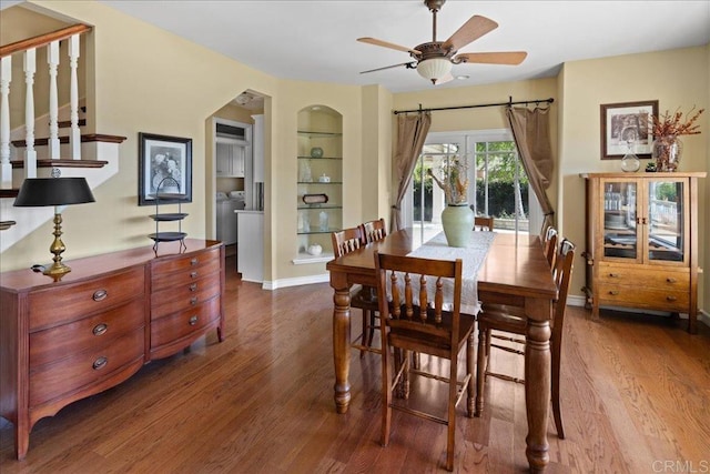 38161 Butterfly Ct, Yucaipa, CA 92399 - dining space with wood finished floors, a ceiling fan, built in features, and washer / dryer