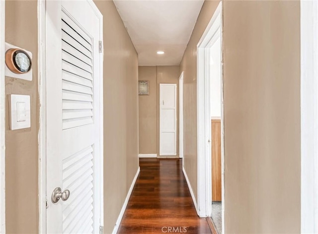 1401 W 165th St, Compton, CA 90220 - hallway with dark wood-type flooring and baseboards