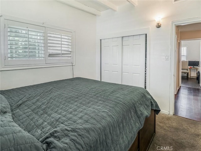 1401 W 165th St, Compton, CA 90220 - bedroom with beamed ceiling, a closet, and carpet floors