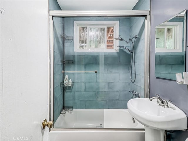 1401 W 165th St, Compton, CA 90220 - bathroom with combined bath / shower with glass door and a sink