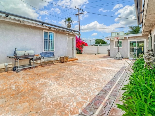 1401 W 165th St, Compton, CA 90220 - view of patio featuring a grill and fence