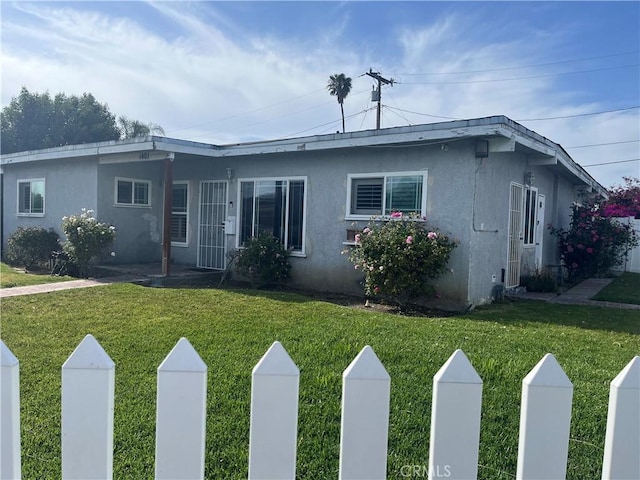 1401 W 165th St, Compton, CA 90220 - view of front of property with a front lawn and stucco siding
