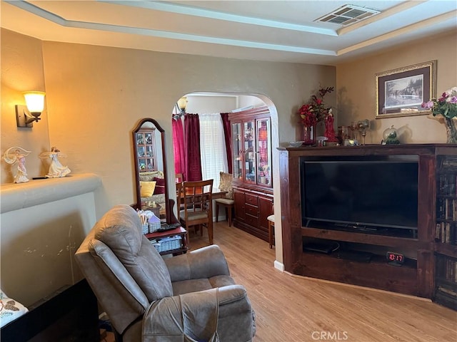 34662 Turner Ln, Yucaipa, CA 92399 - living room with wood finished floors, arched walkways, and a raised ceiling